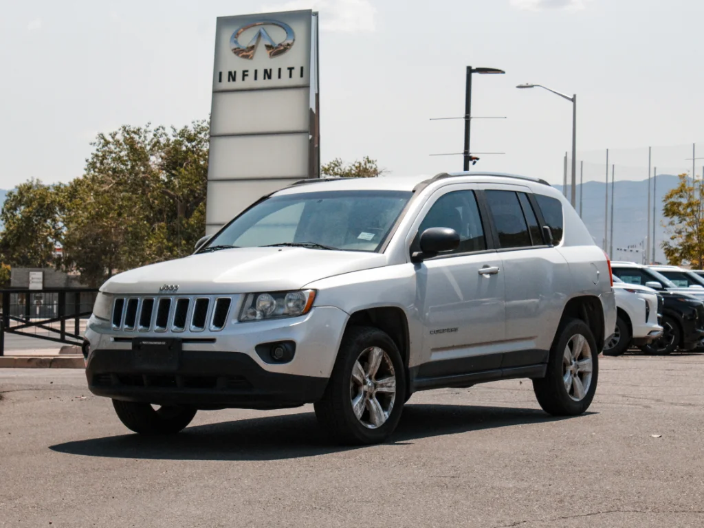 Used 2012 Bright Silver Metallic Clearcoat Jeep Sport image 1