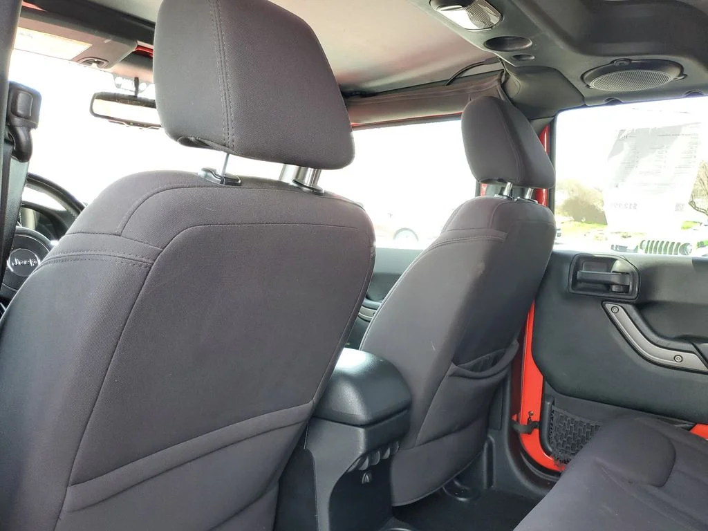 Used 2013 Red Jeep Unlimited Sport image 11