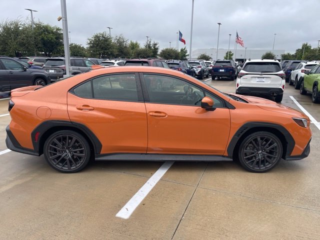 Used 2023 Solar Orange Pearl Subaru Premium image 2