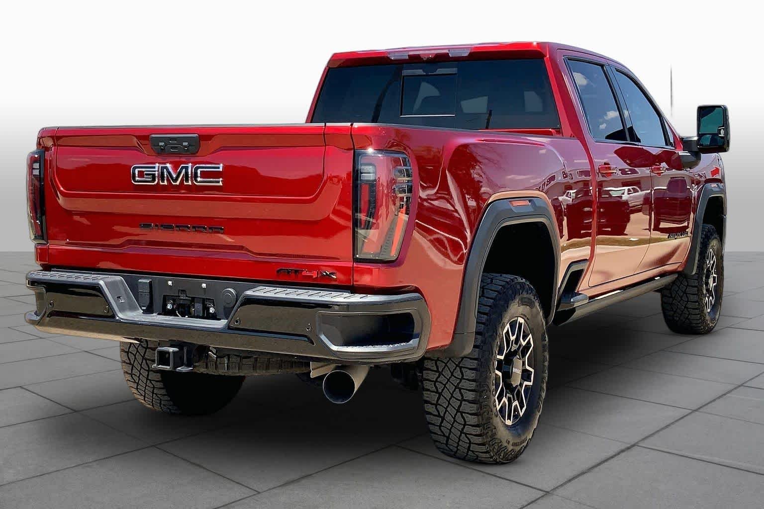 Used 2025 Volcanic Red Tintcoat GMC AT4X image 13