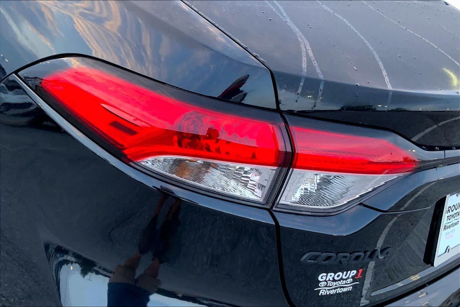 Used 2024 Midnight Black Metallic Toyota LE image 25