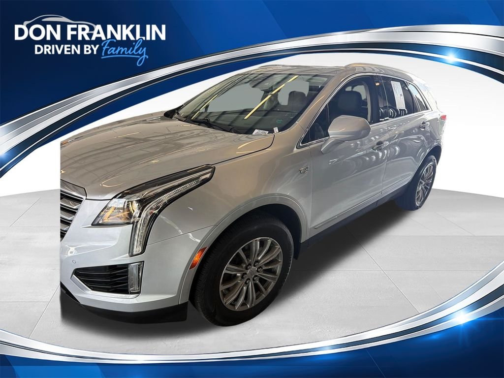 Used 2018 Silver Cadillac Luxury image 1