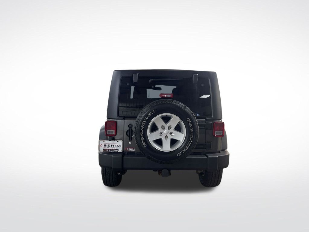 Used 2018 Gray Jeep Unlimited Sport image 4