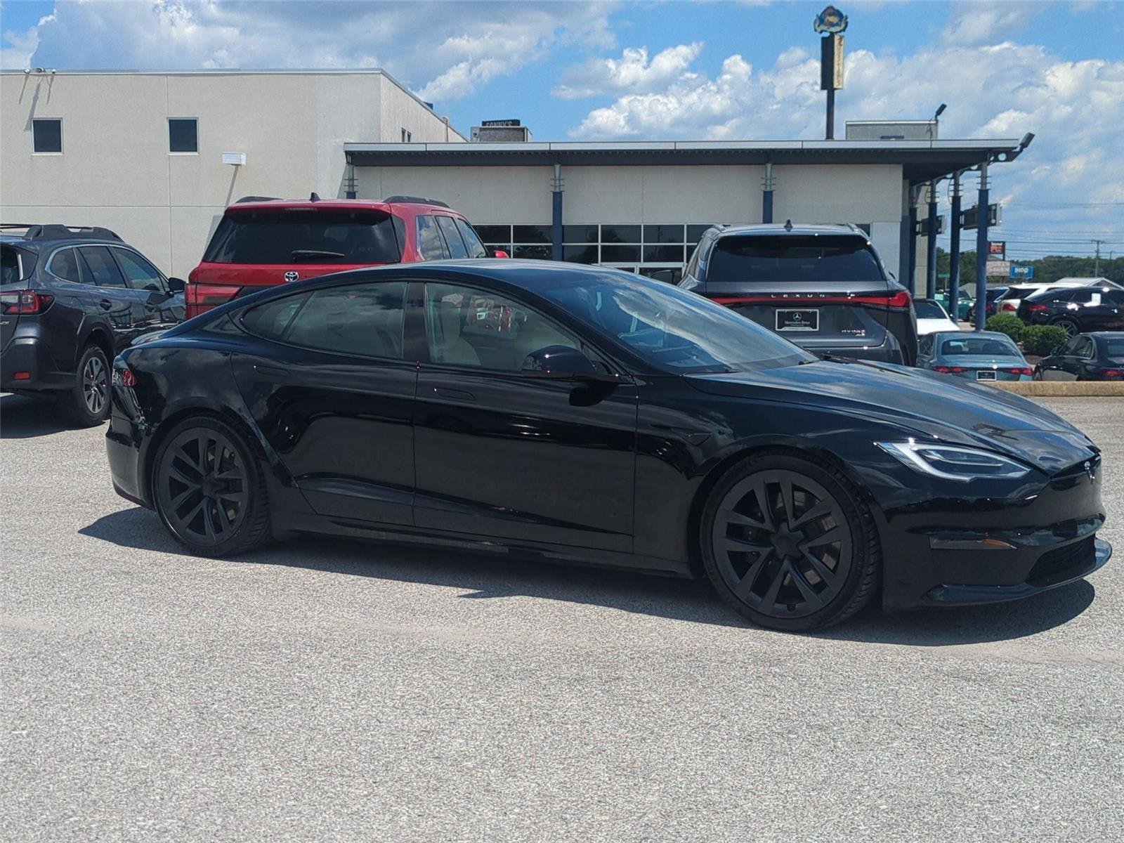 Used 2021 Solid Black Tesla Plaid image 7