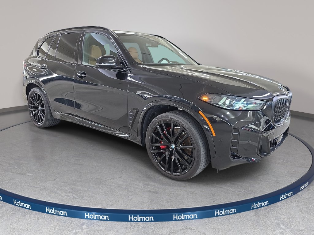 Used 2024 Black Sapphire Metallic BMW sDrive40i image 4
