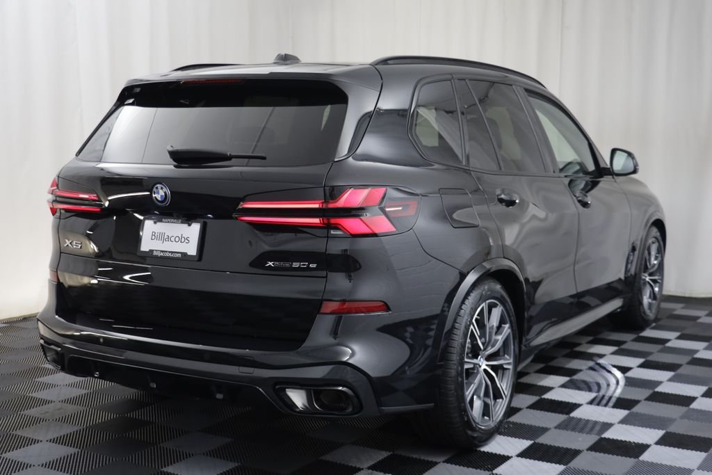 New 2026 Black Sapphire Metallic BMW xDrive50e image 18