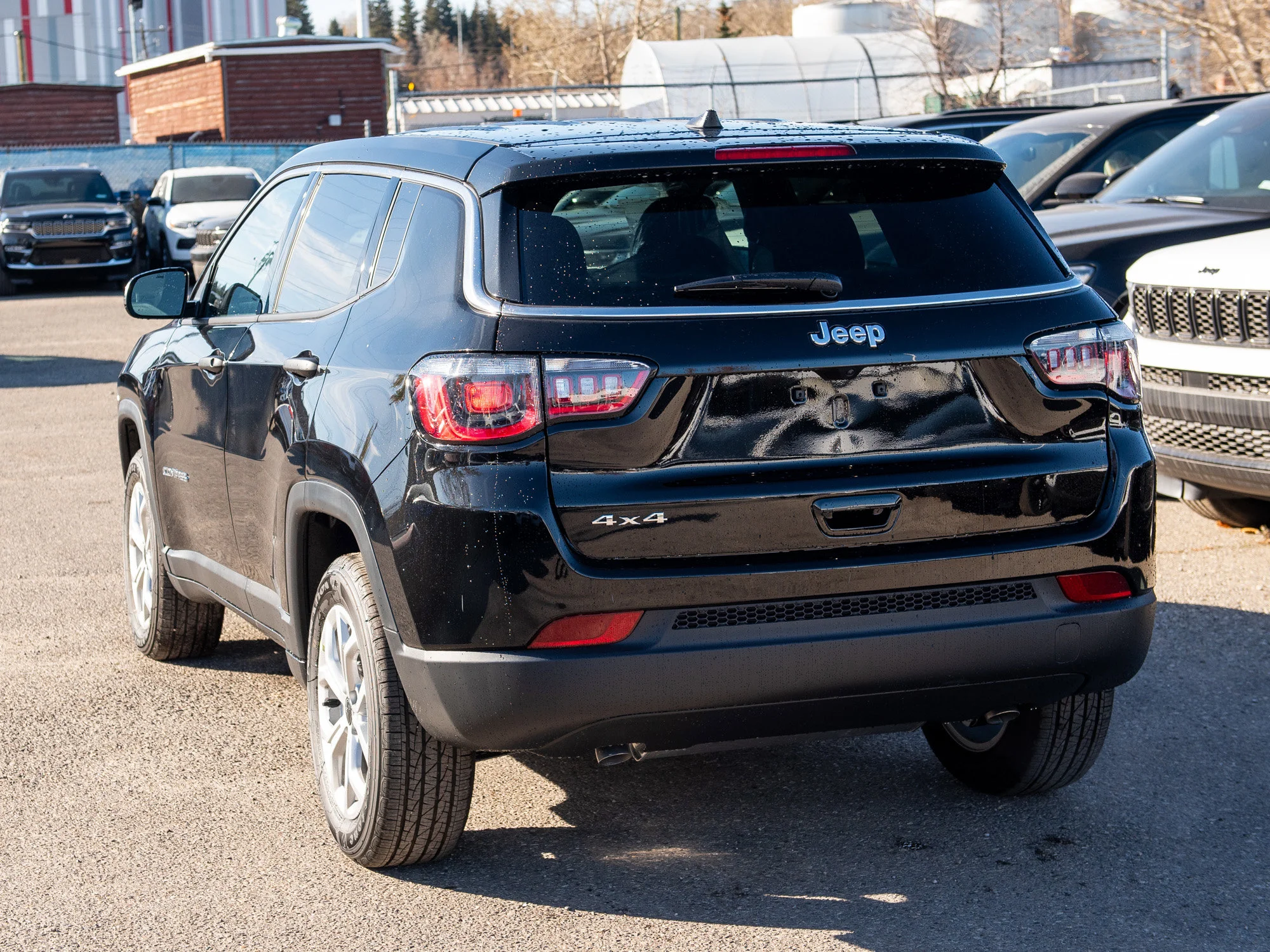 New 2026 Black Jeep Sport* image 2