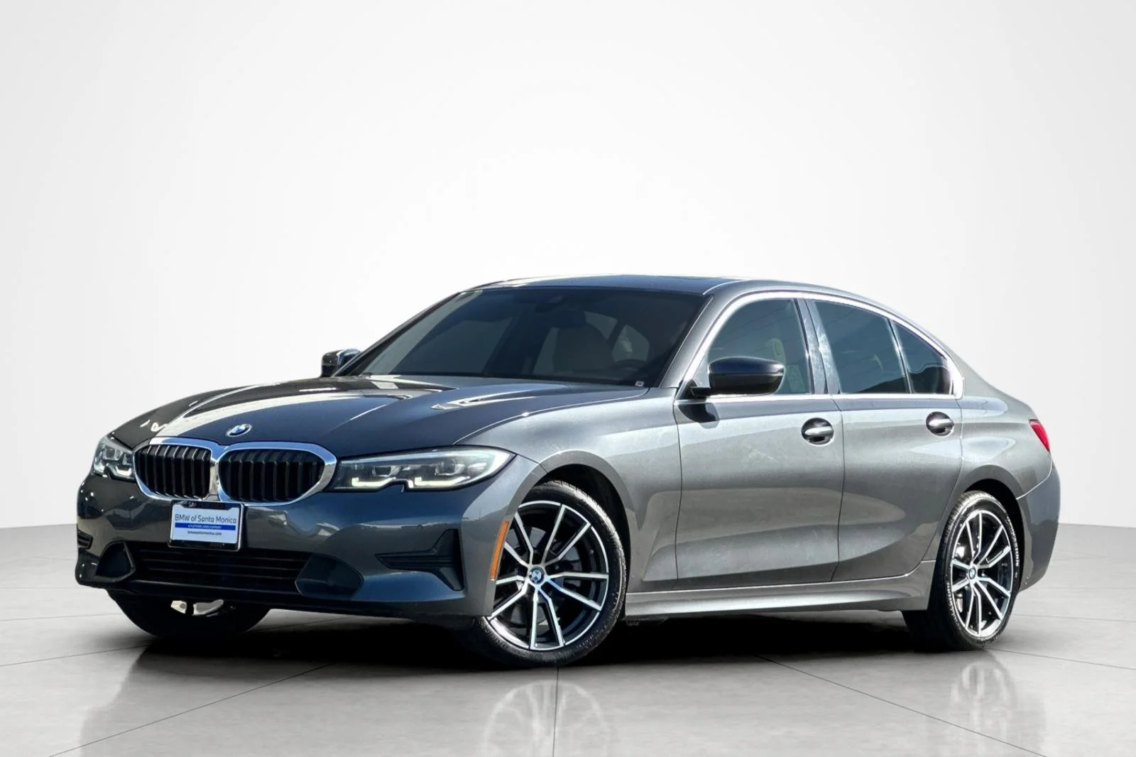 Used 2021 Mineral Grey Metallic BMW 330i image 1
