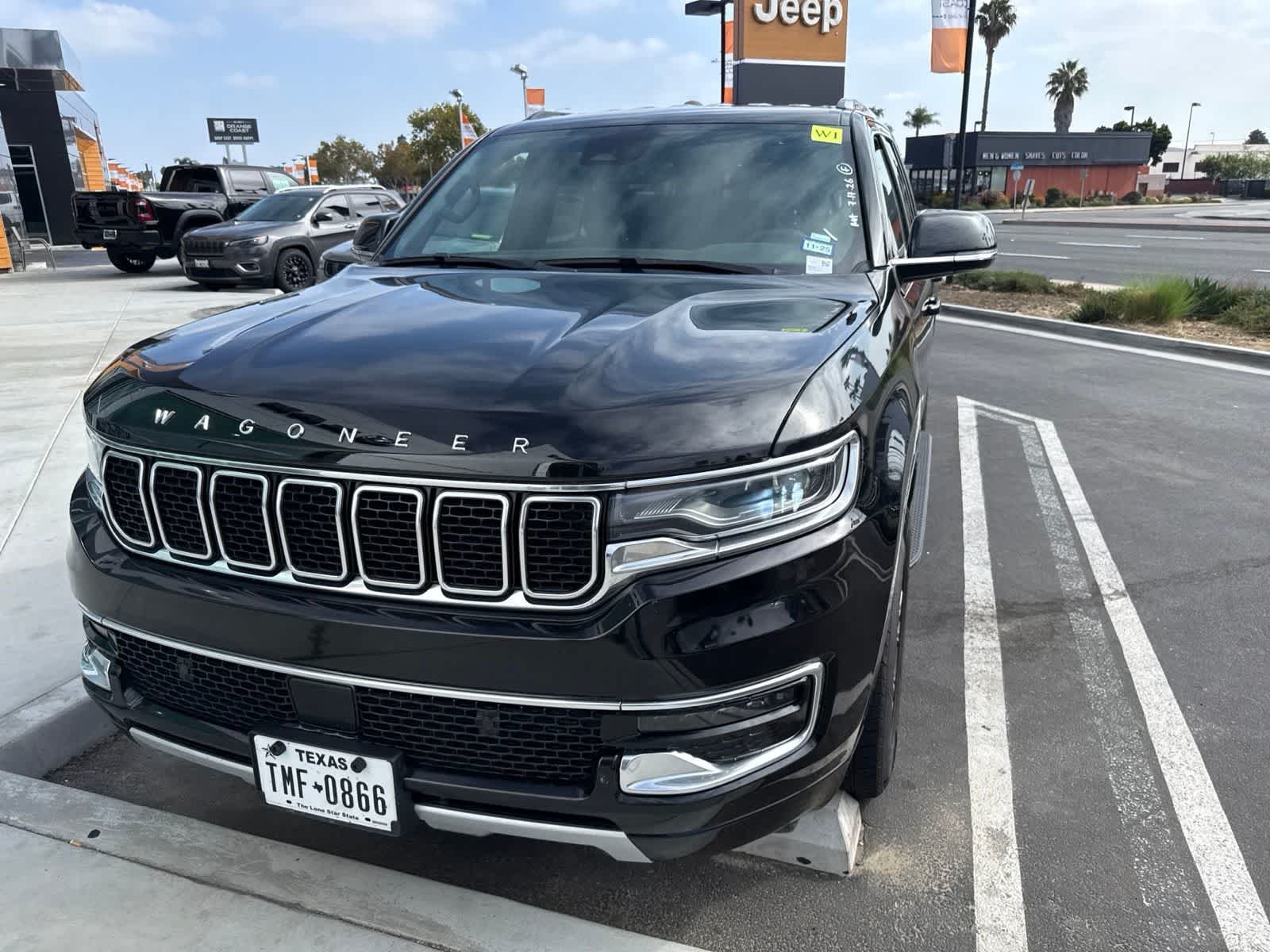 Used 2024 Diamond Black Crystal Pearlcoat Jeep Series II image 2