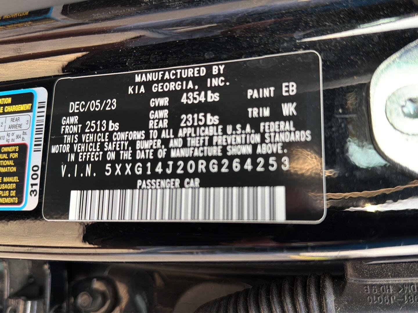 Used 2024 Ebony Black Kia LXS image 38