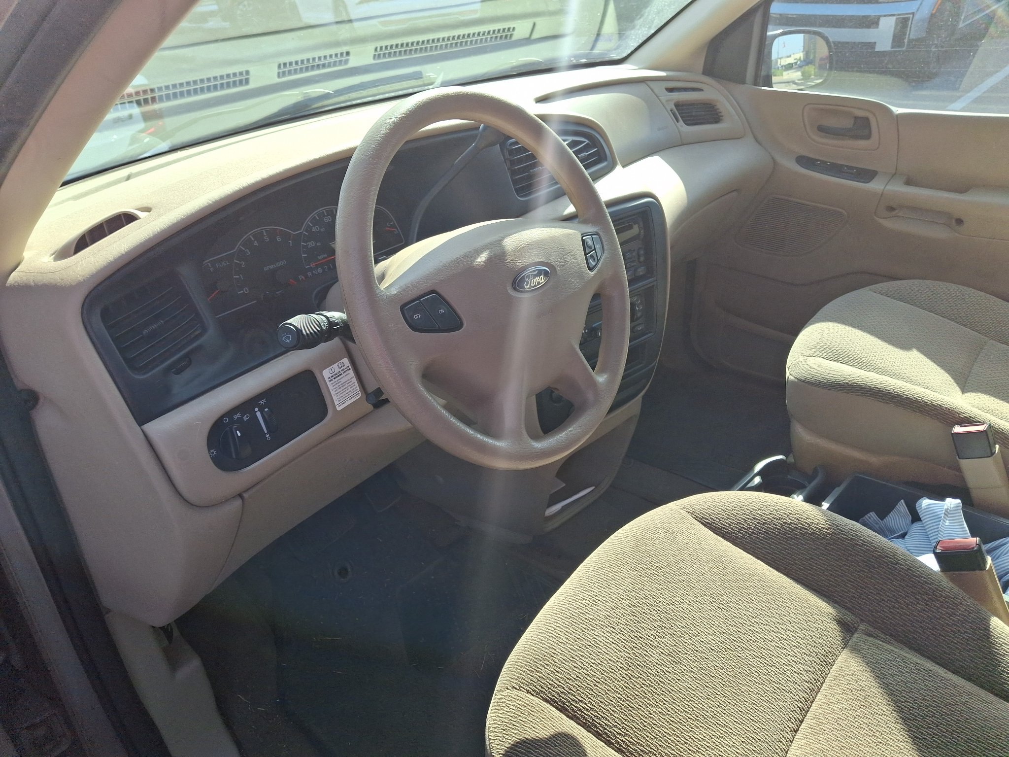 Used 2003 Silver Frost Clearcoat Metallic Ford LX image 3