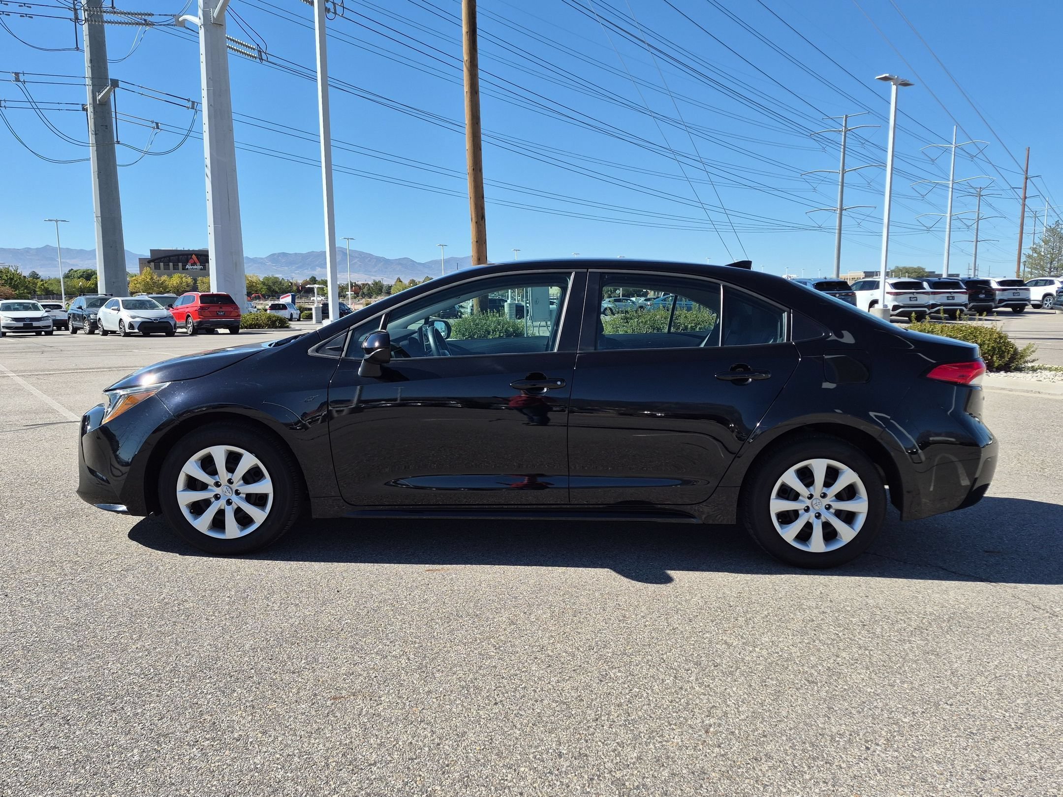 Used 2026 Midnight Black Metallic Toyota LE image 7