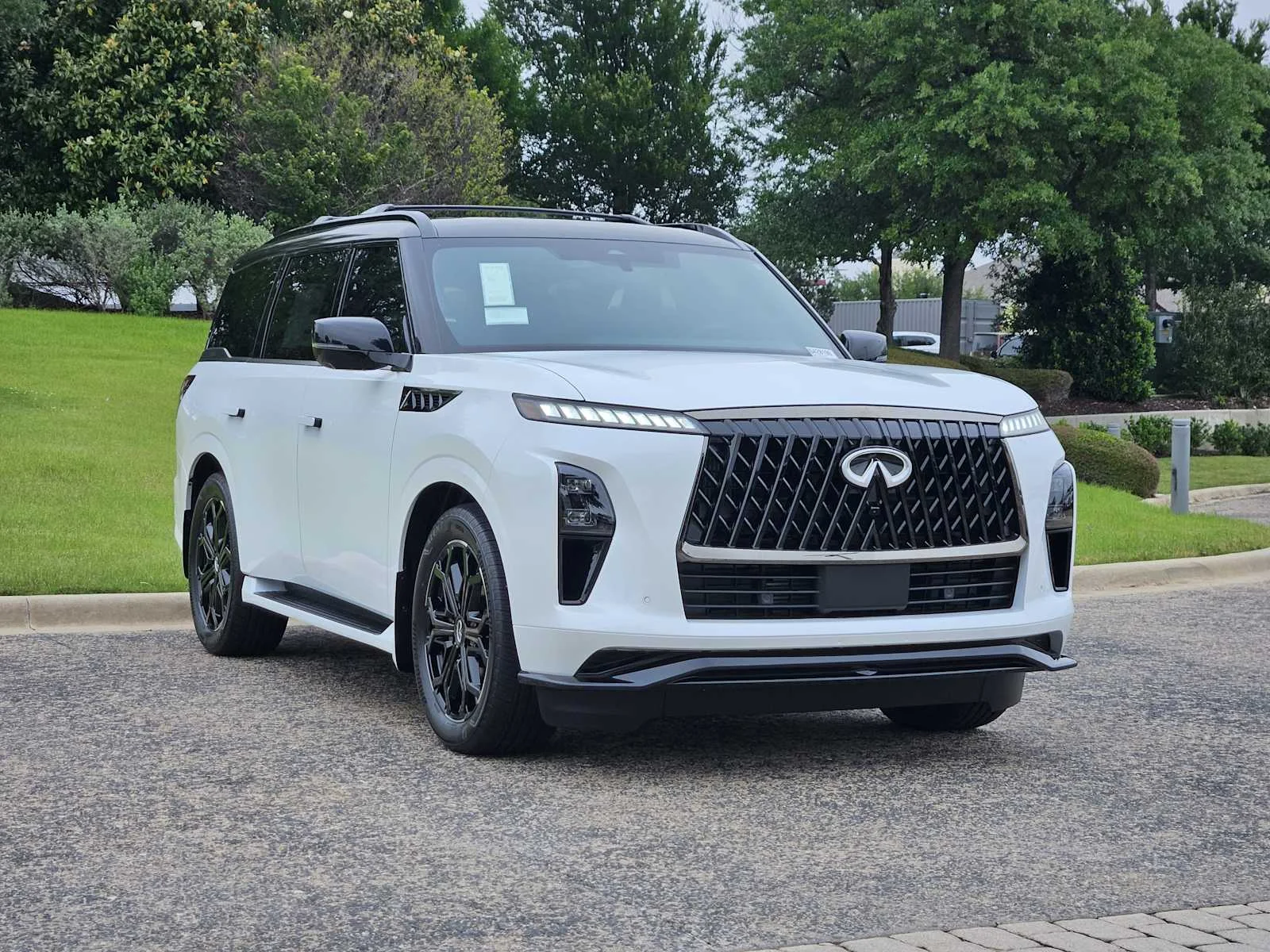 New 2026 RADIANT WHITE INFINITI Sport 4WD image 2