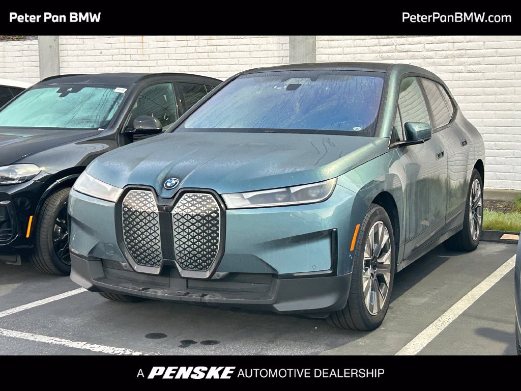 Certified Used 2024 Blue BMW xDrive50 image 1