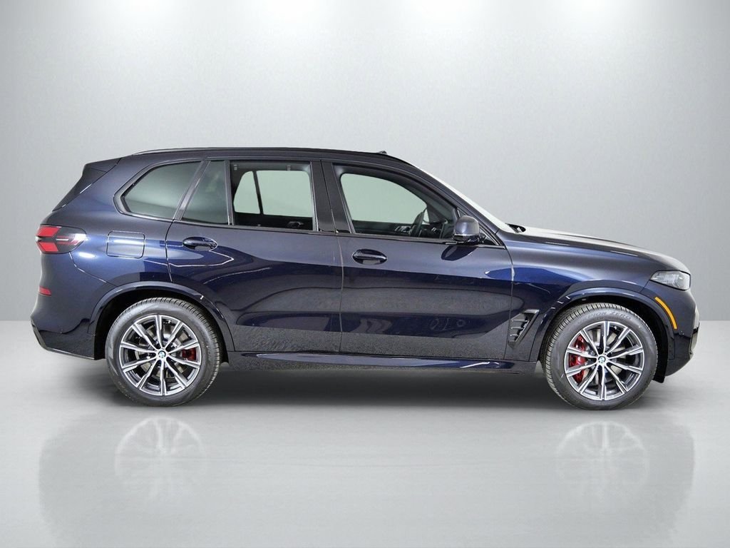 Used 2026 Carbon Black Metallic BMW xDrive50e image 9