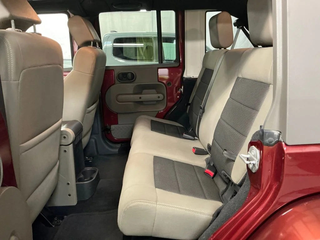 Used 2010 Red Jeep Unlimited Sahara image 24