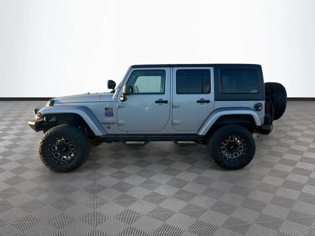 Used 2015 Silver Jeep Unlimited Sahara image 4