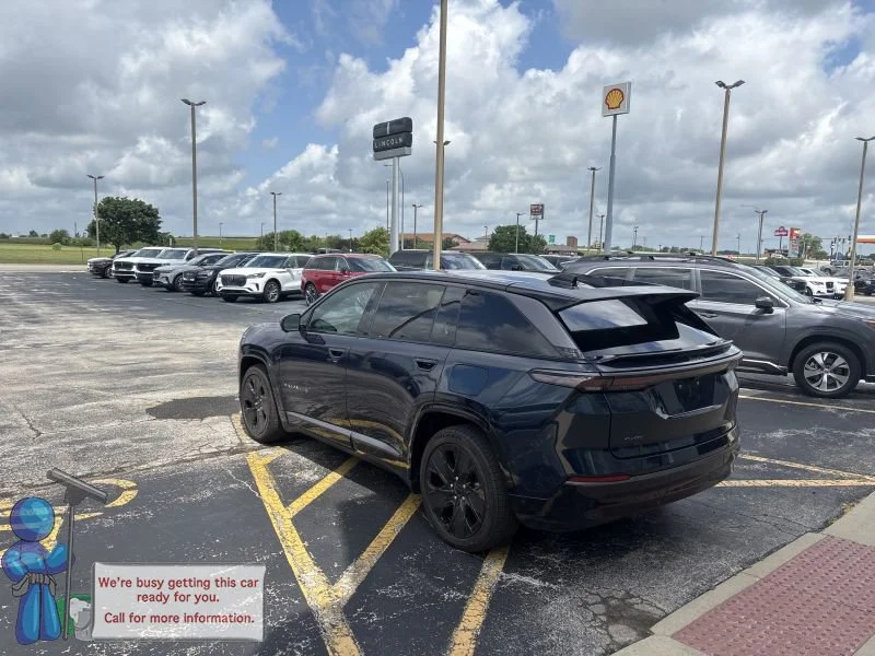 Used 2025 Fathom Blue Pearlcoat Jeep Launch Edition image 3