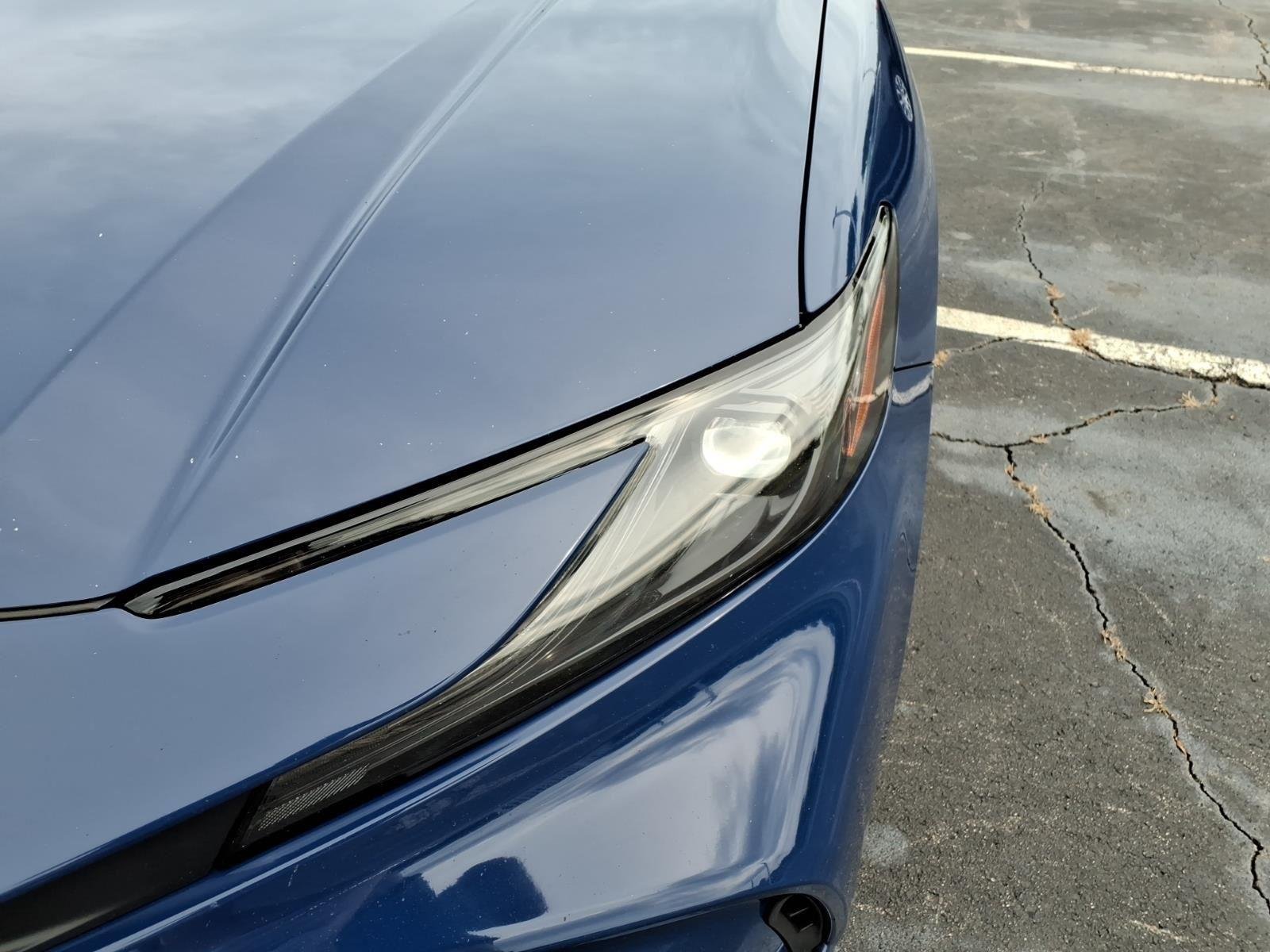 Used 2025 Reservoir Blue Toyota LE image 16