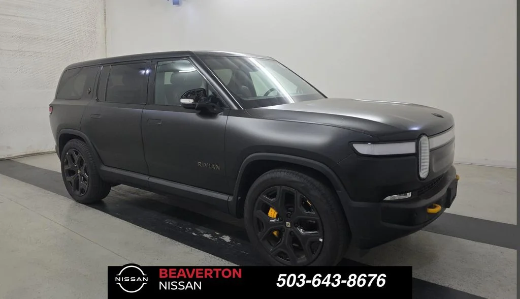 Used 2024 Black Rivian Adventure image 1