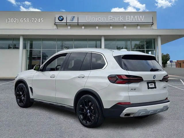 Certified Used 2025 Mineral White Metallic BMW xDrive50e image 6