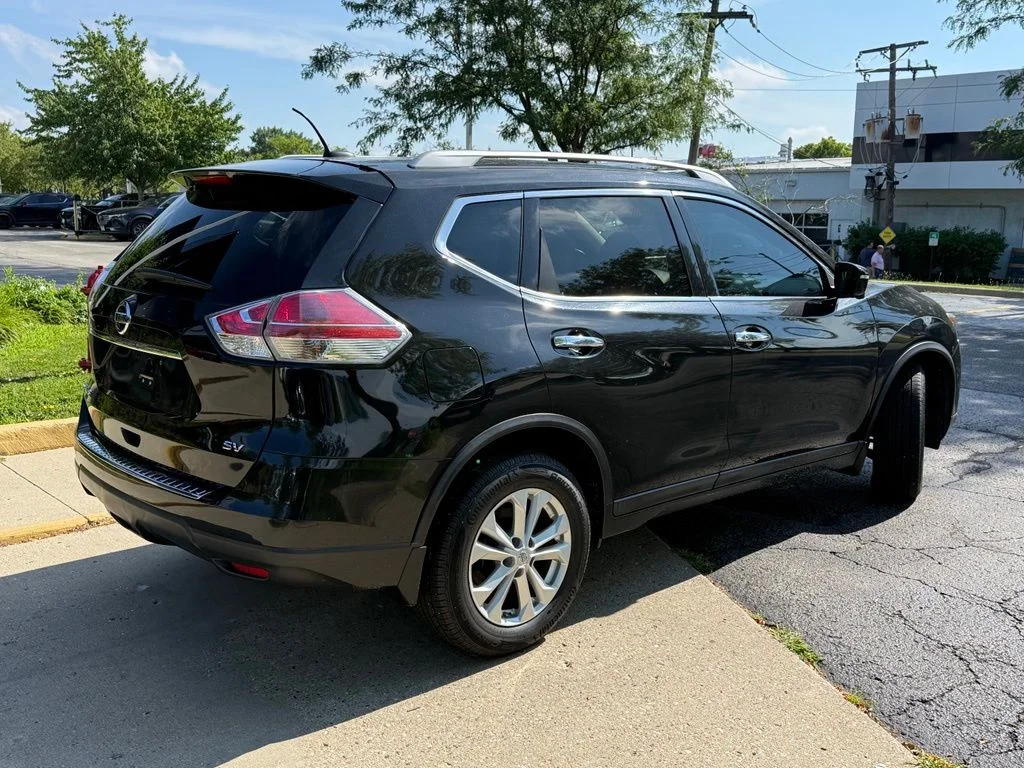 Used 2016 Black Nissan SV image 7