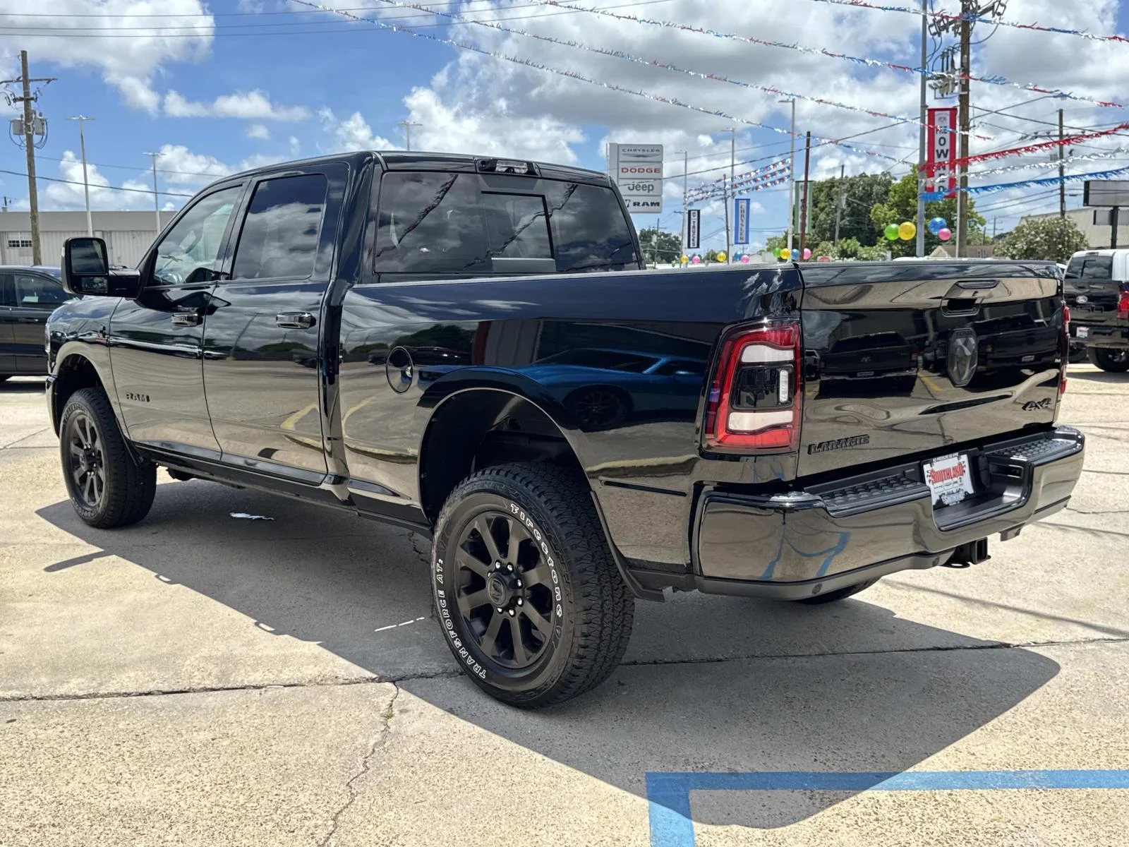 Used 2024 Diamond Black Crystal Pearlcoat Ram Laramie image 5