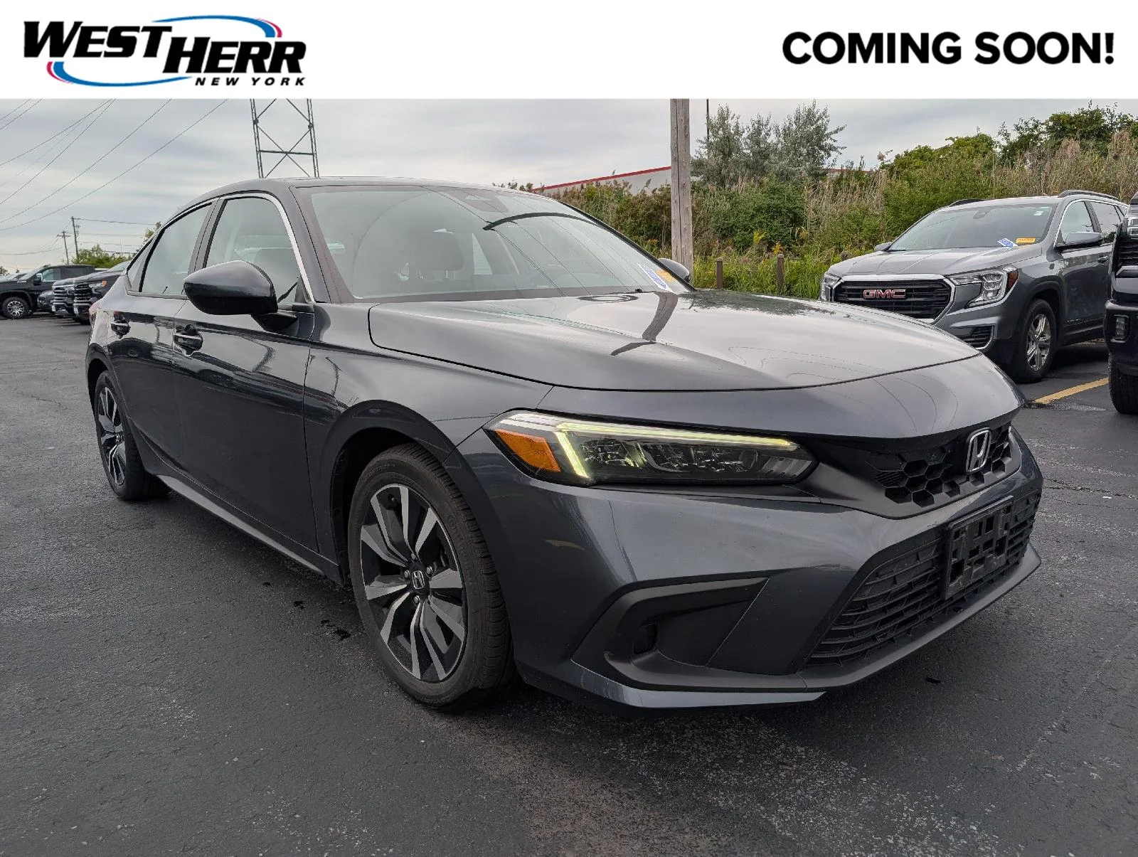 Used 2024 Meteorite Gray Metallic Honda EX-L image 1