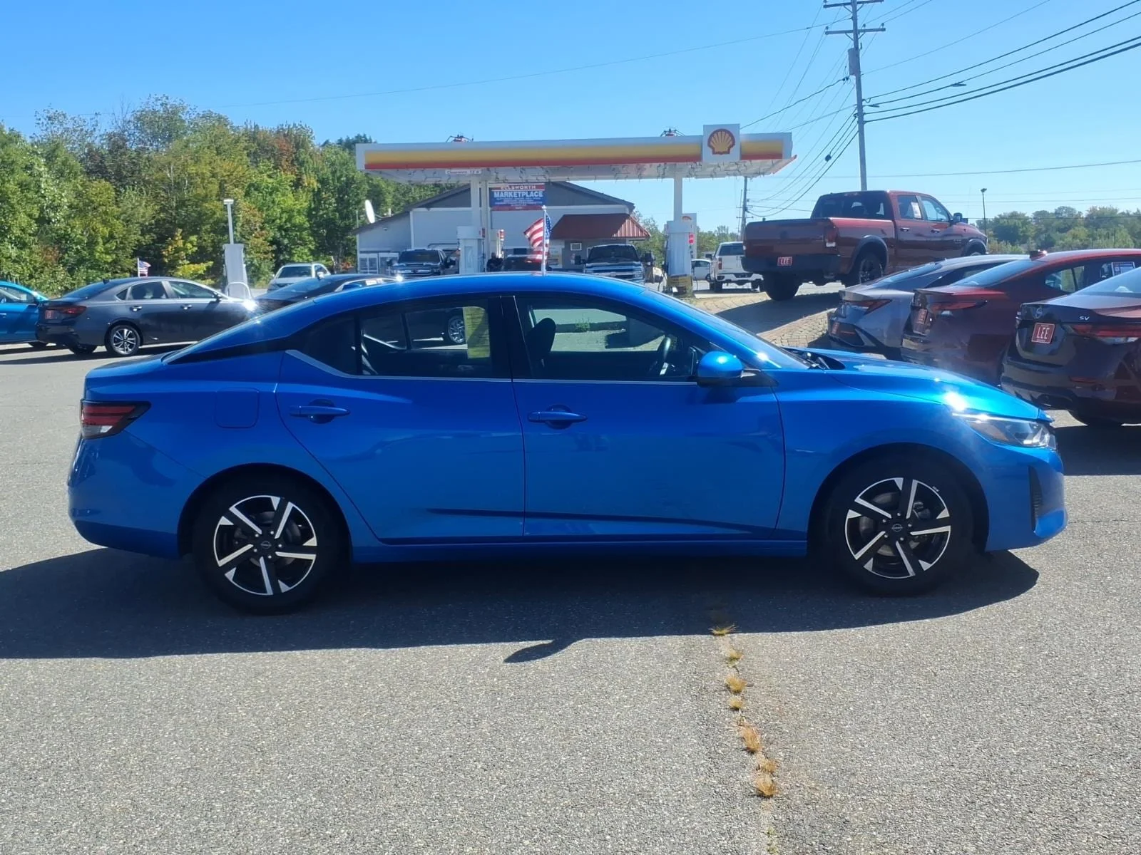 Used 2025 Electric Blue Metallic Nissan SV image 4
