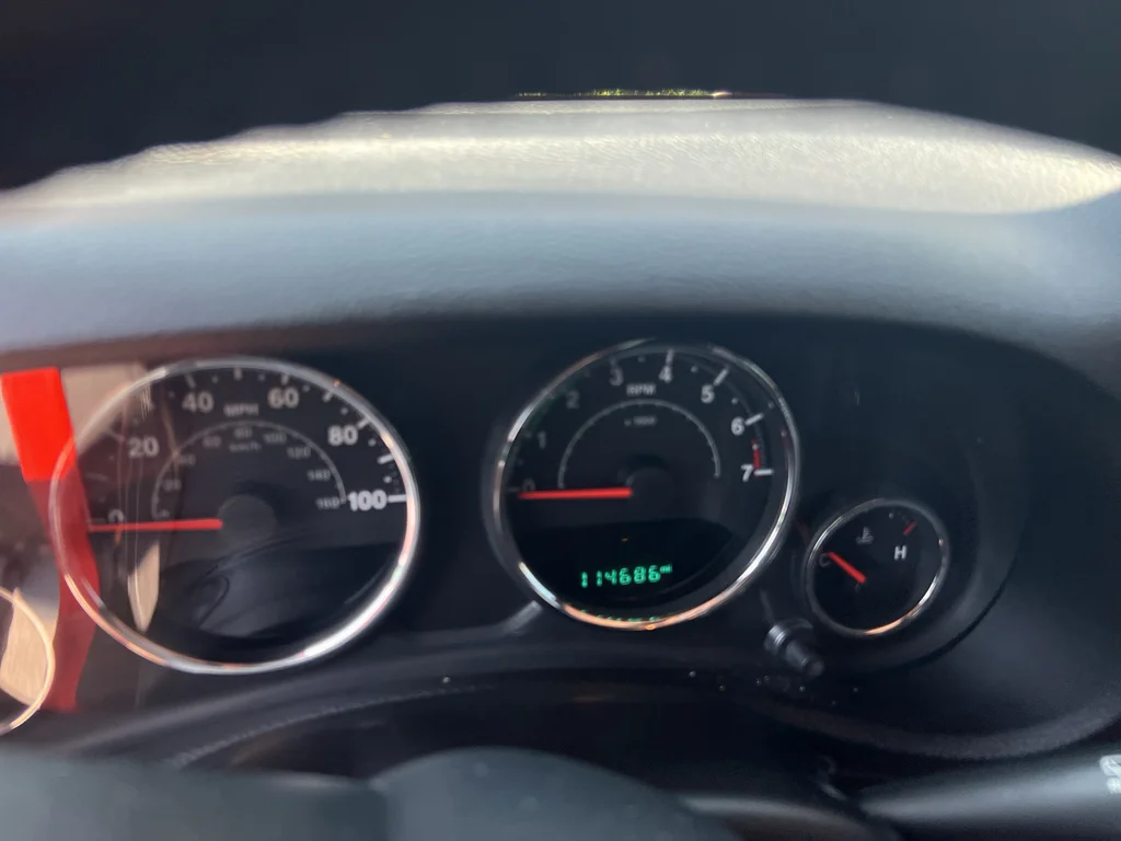 Used 2015 Sunset Orange Pearlcoat Jeep Sahara image 4
