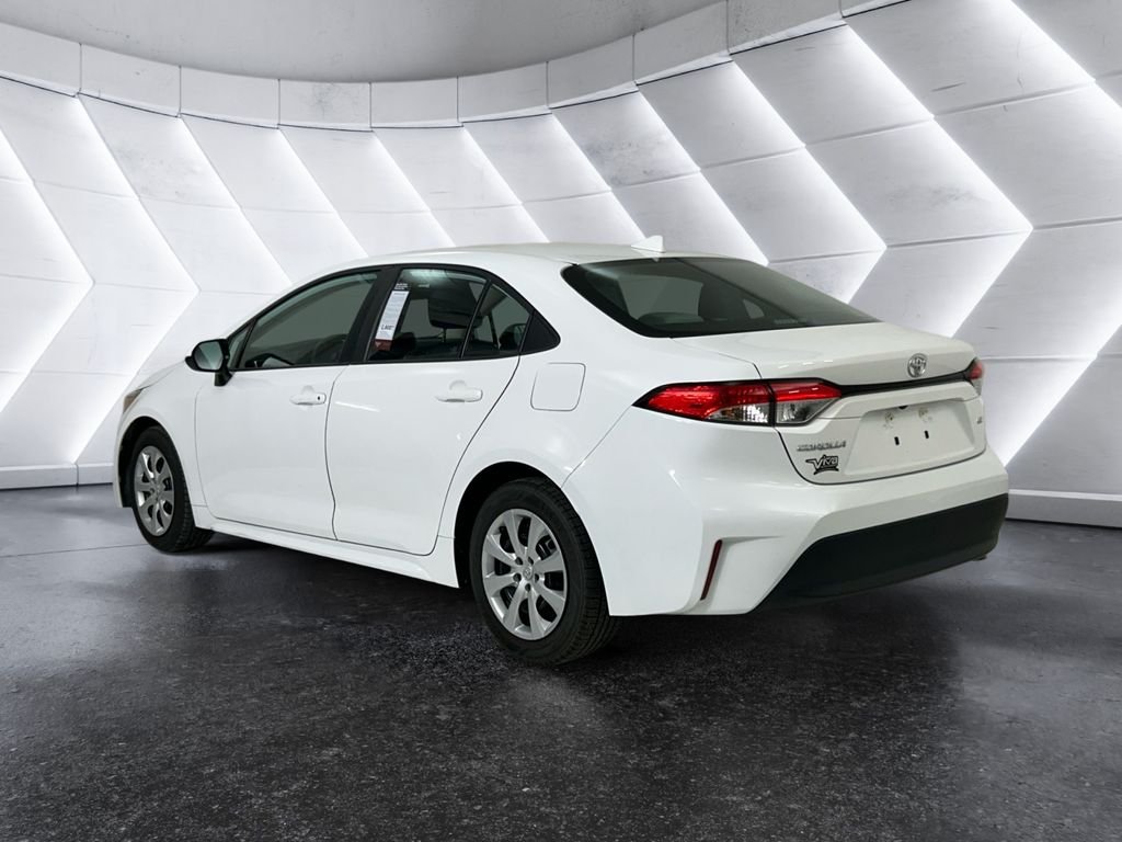 Used 2023 White Toyota LE image 6
