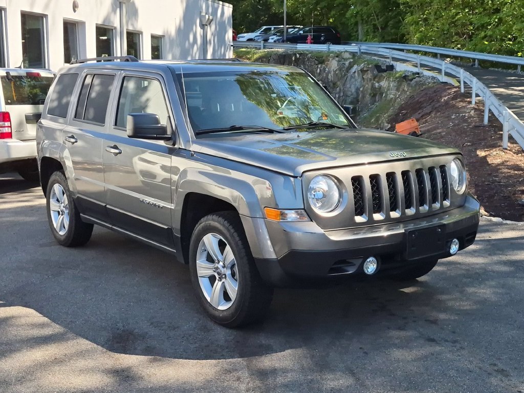 Used 2012 Gray Jeep Sport image 1