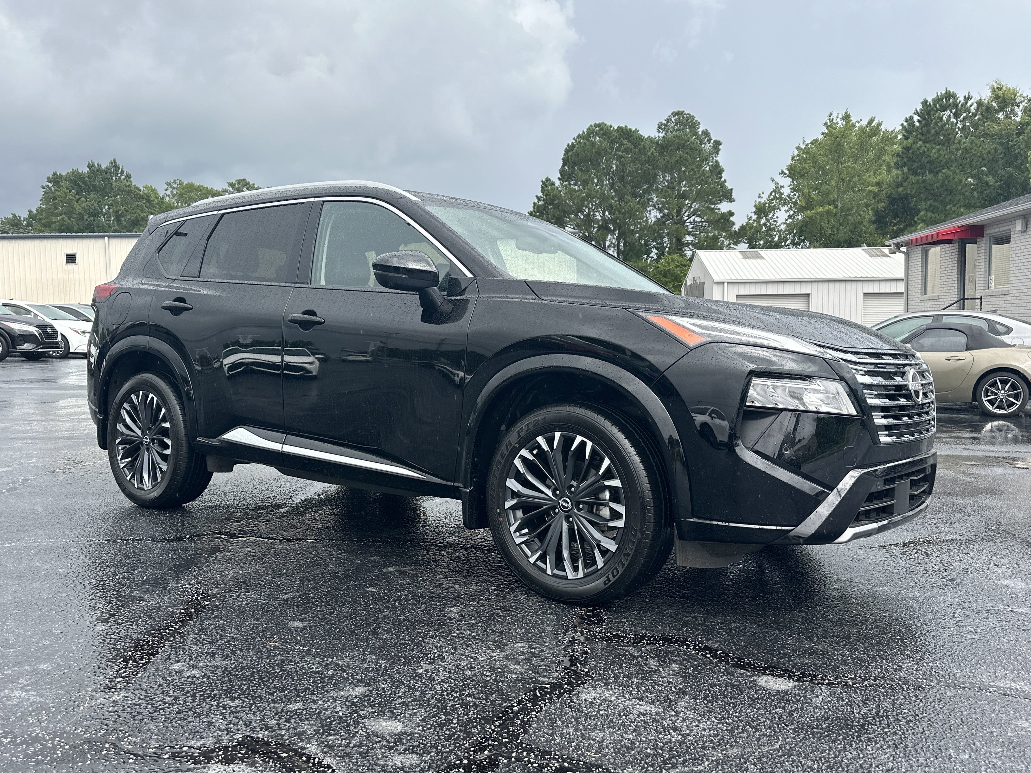 Used 2024 Super Black Nissan Platinum image 2