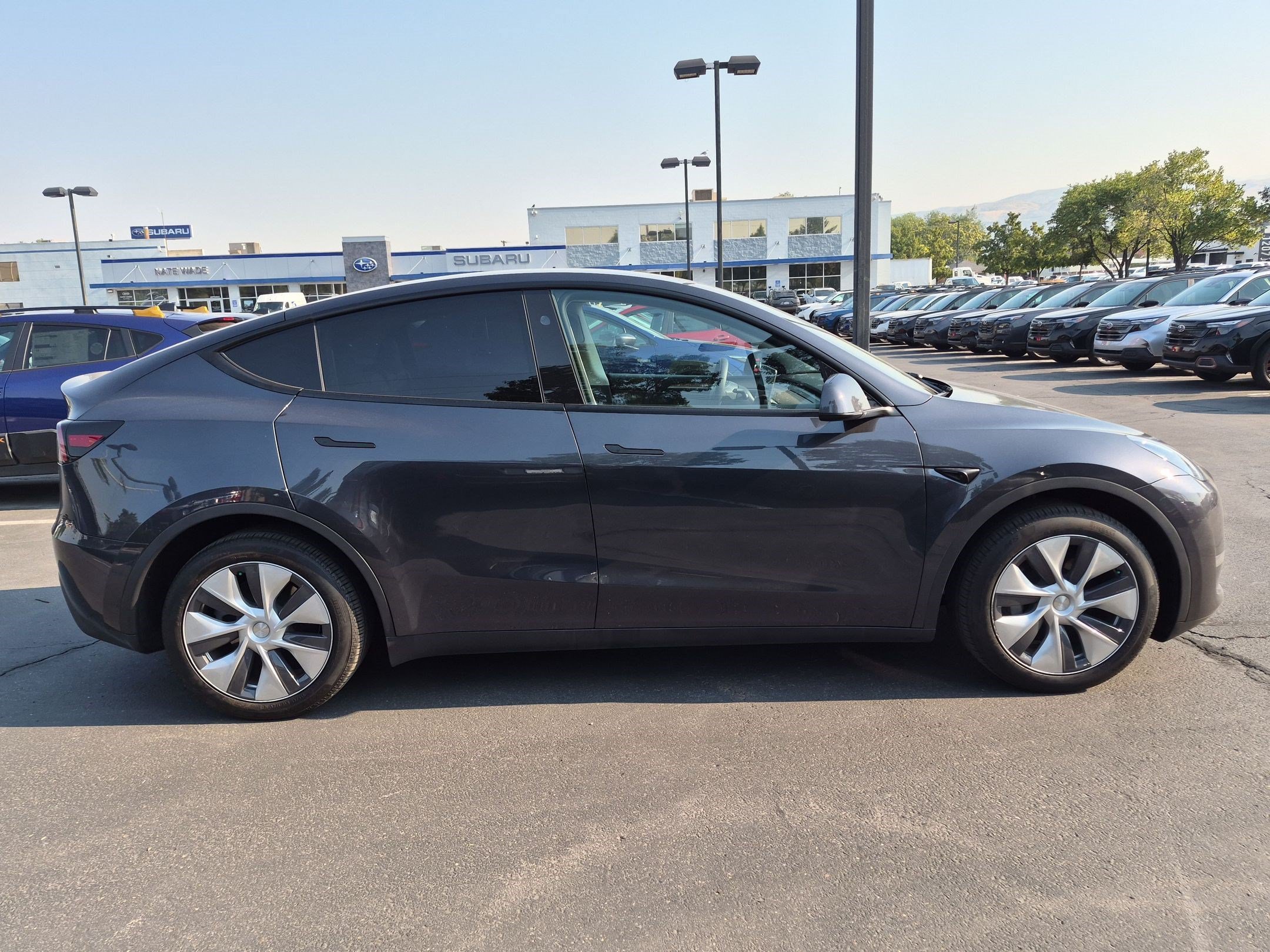 Used 2024 Tesla Model Y Long Range with VIN 7SAYGDEE5RA222834 for sale in Salt Lake City, UT