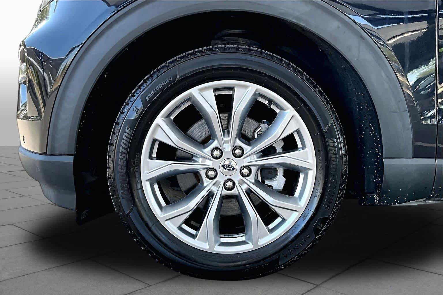 Used 2021 Agate Black Metallic Ford Limited image 11