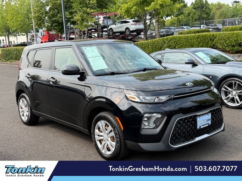 Used 2021 Cherry Black Kia LX image 1