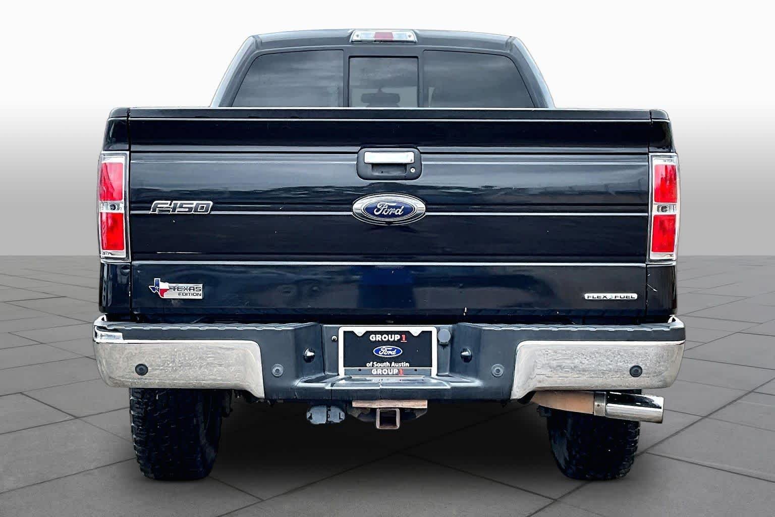 Used 2014 Tuxedo Black Metallic Ford XLT image 4