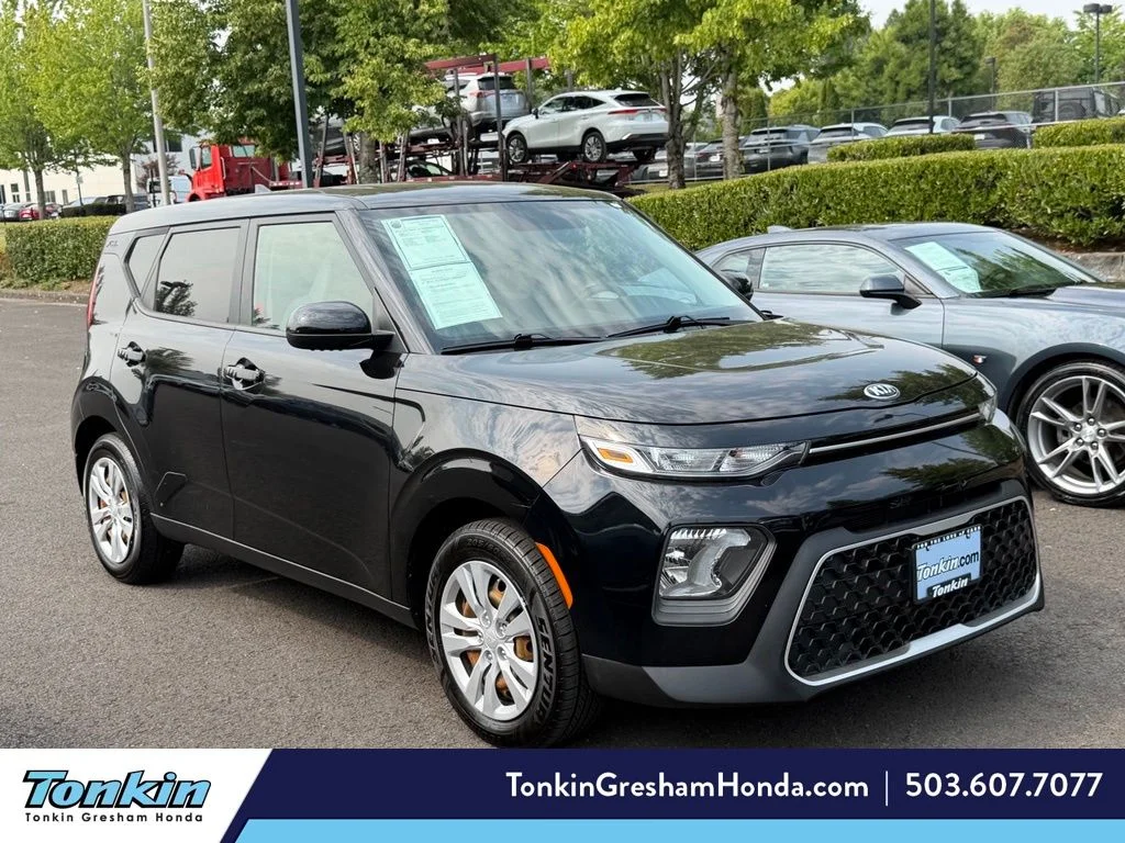 Used 2021 Cherry Black Kia LX image 1