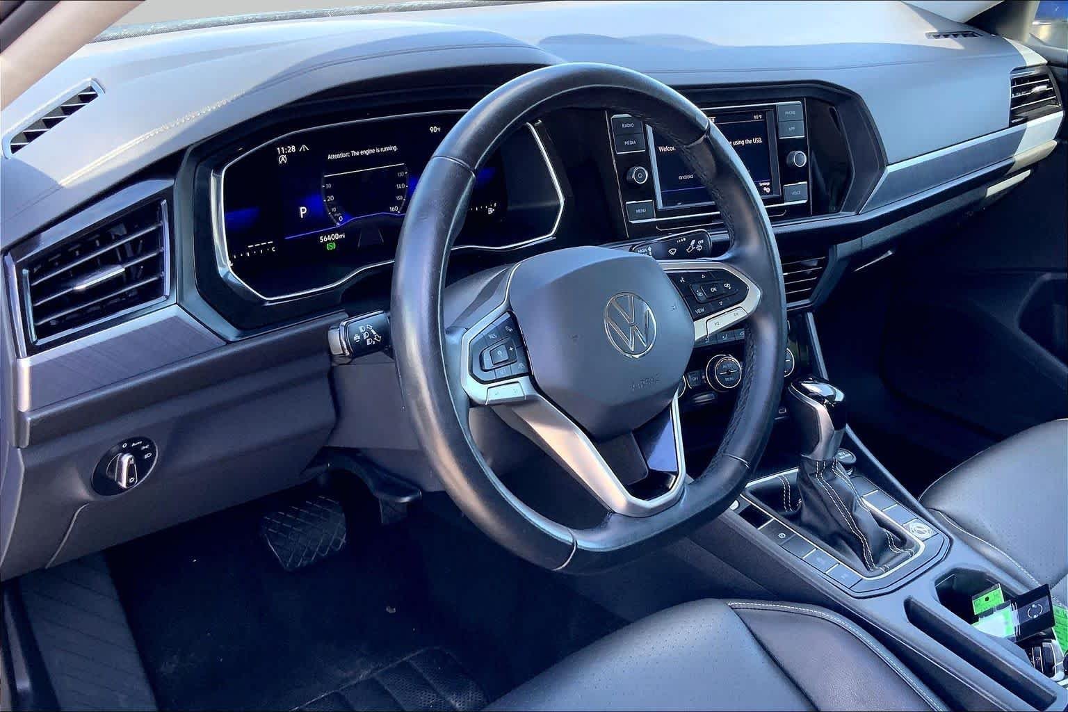 Used 2024 Rising Blue Metallic Volkswagen SE image 16