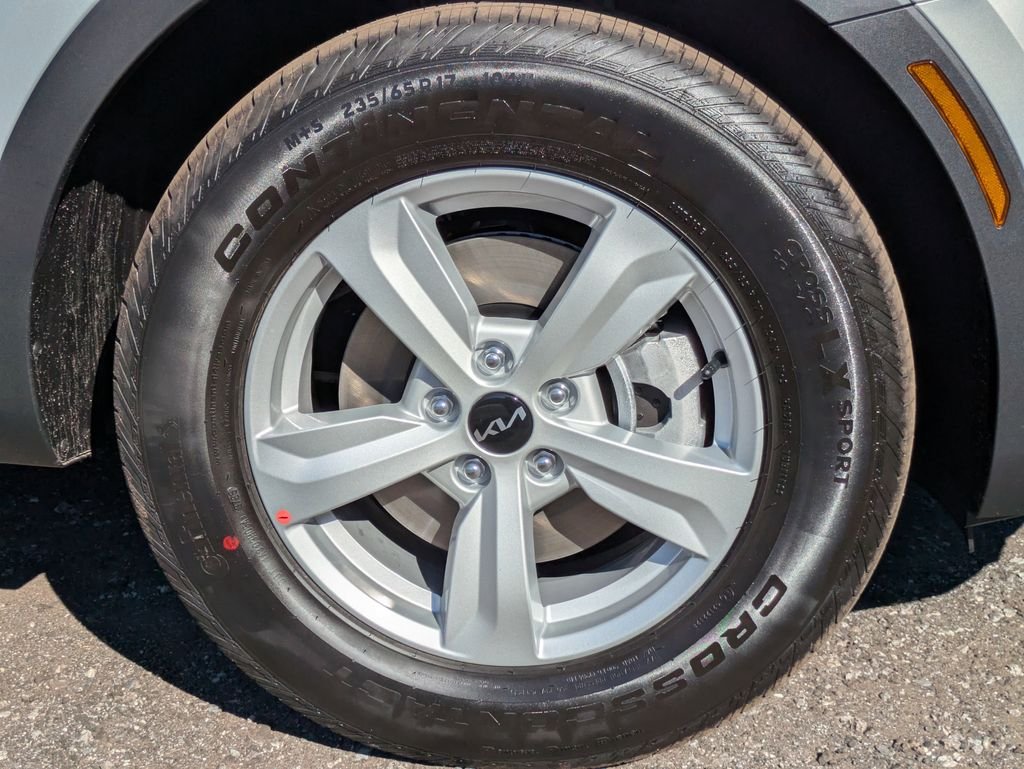 New 2026 Ivory Silver Kia LX image 10