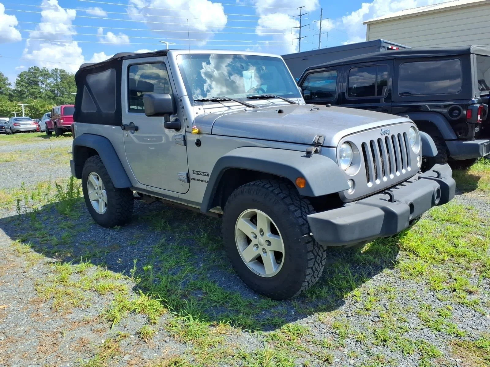 Used 2015 Billet Silver Metallic Clearcoat Jeep Sport image 11