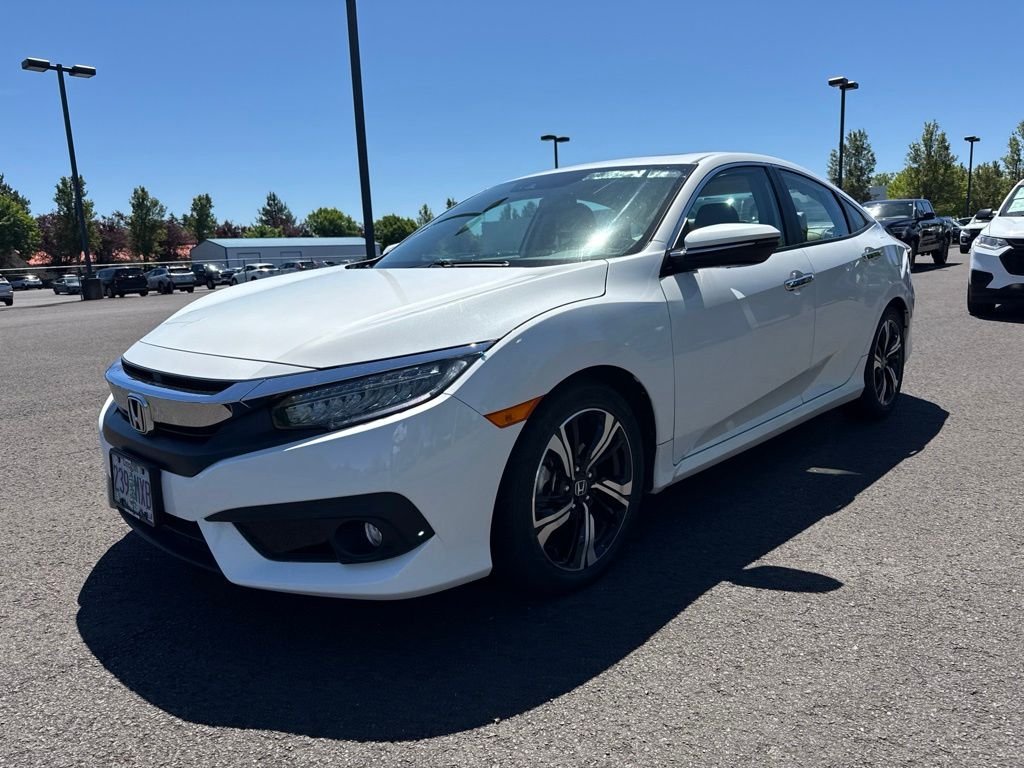 Used 2016 White Orchid Pearl Honda Touring image 3