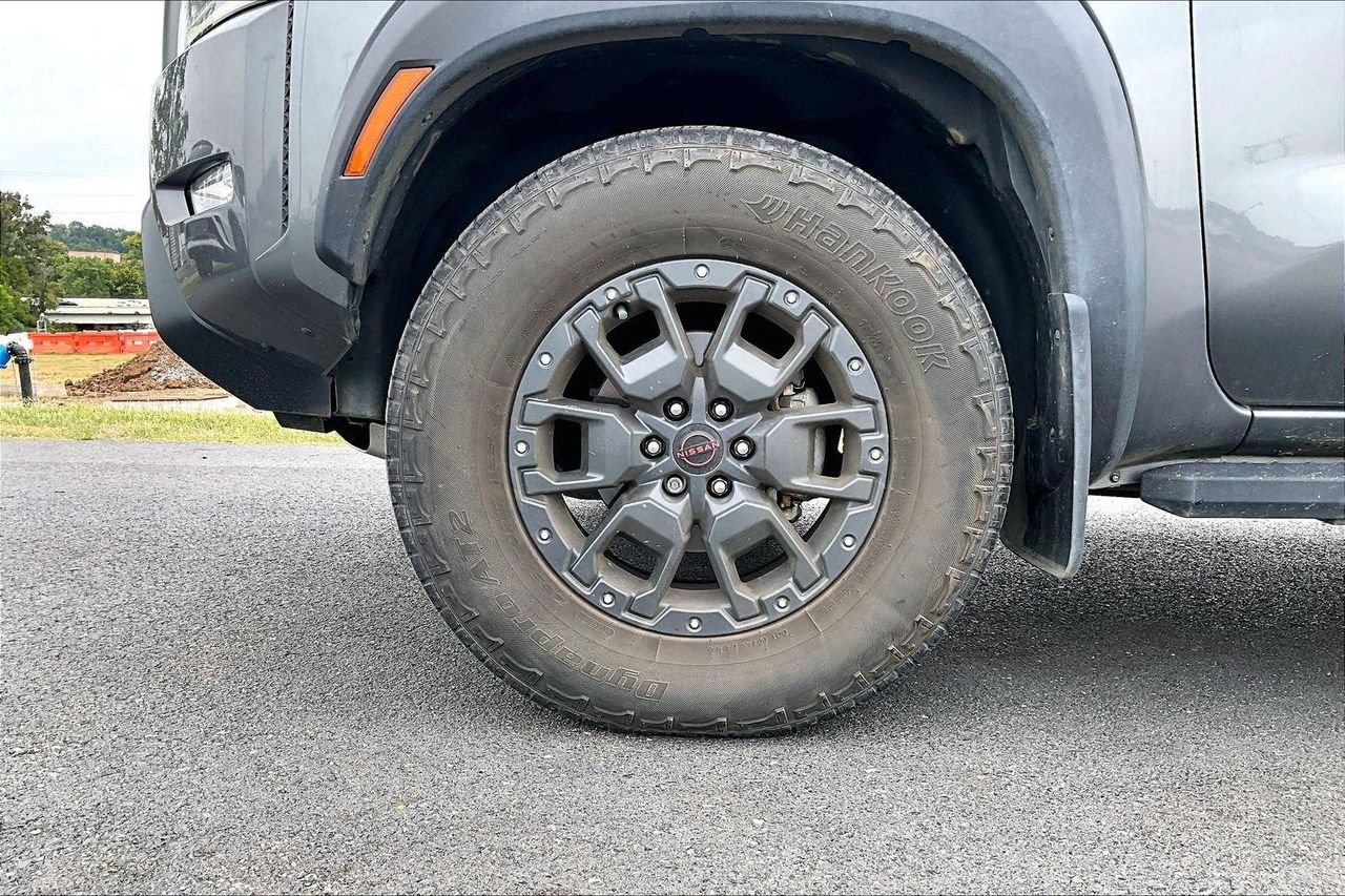 Used 2023 Gun Metallic Nissan Crew Cab PRO-4X 4x4 image 2