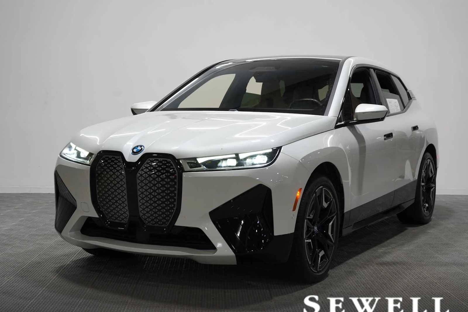 Certified Used 2024 Mineral White Metallic BMW xDrive50 image 1