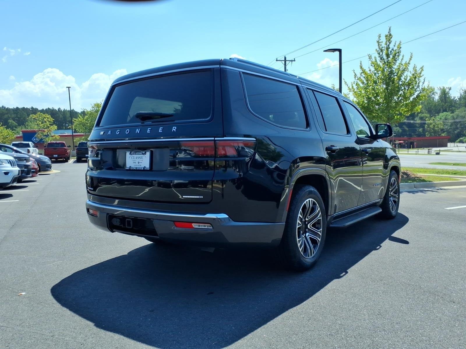 Used 2022 Diamond Black Crystal Pearlcoat Jeep Series III image 2