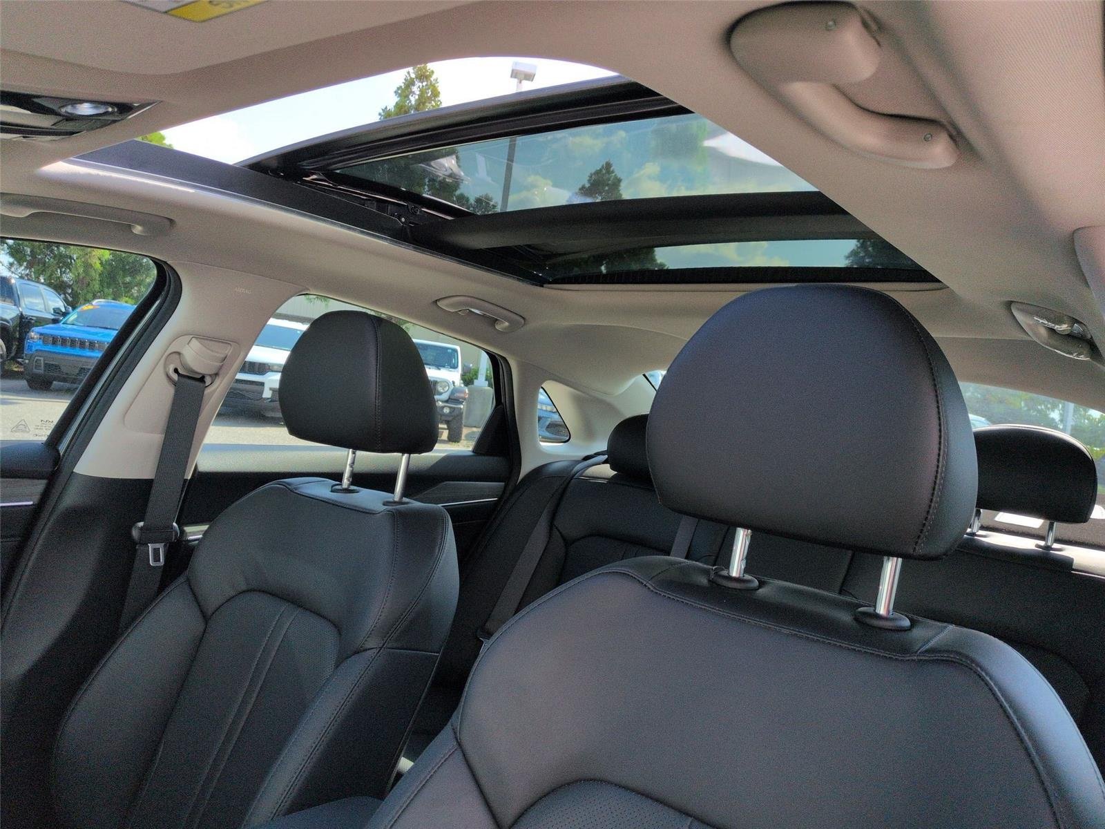 Used 2025 Interstellar Gray Kia EX image 32