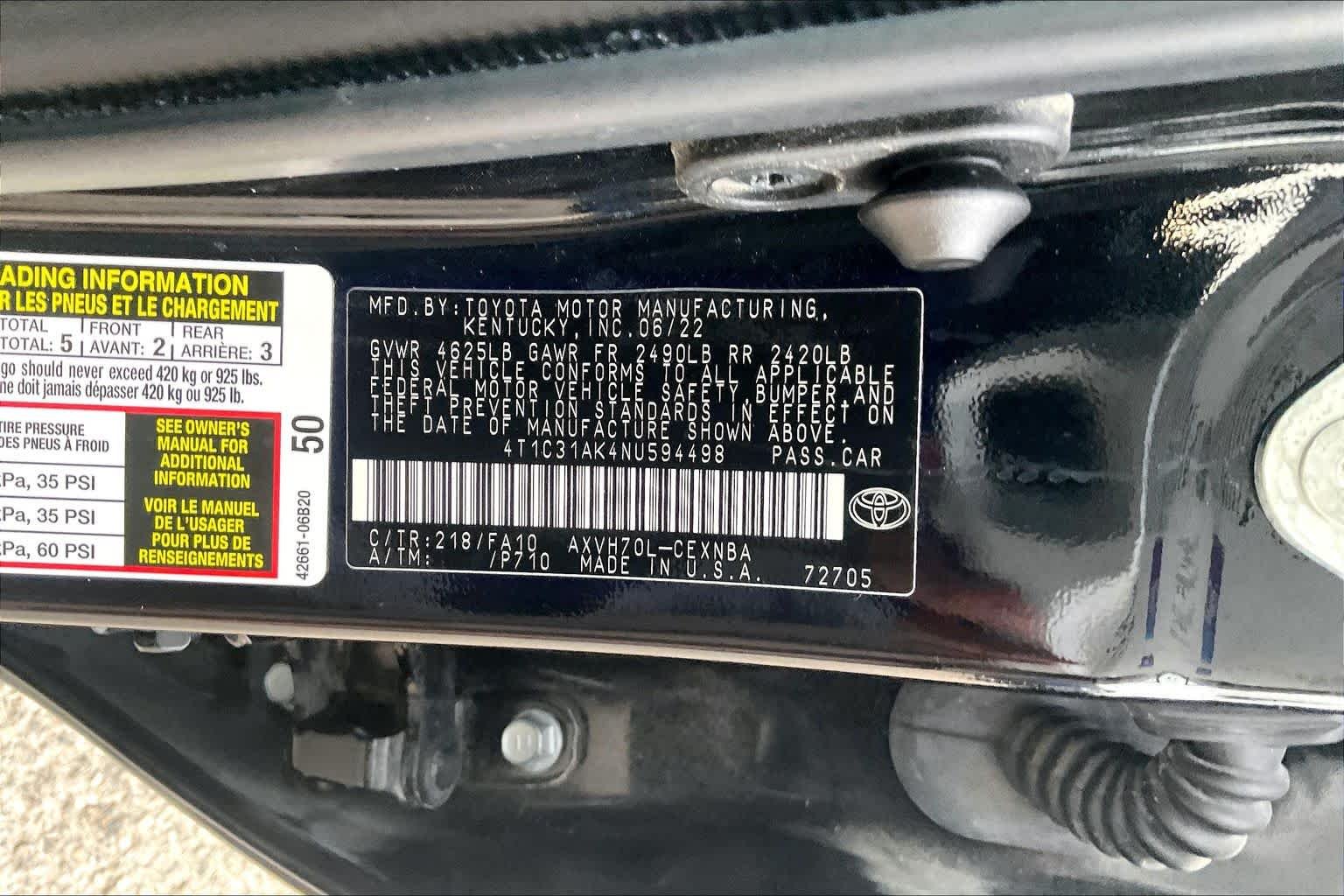 Used 2022 Midnight Black Metallic Toyota Hybrid LE image 32