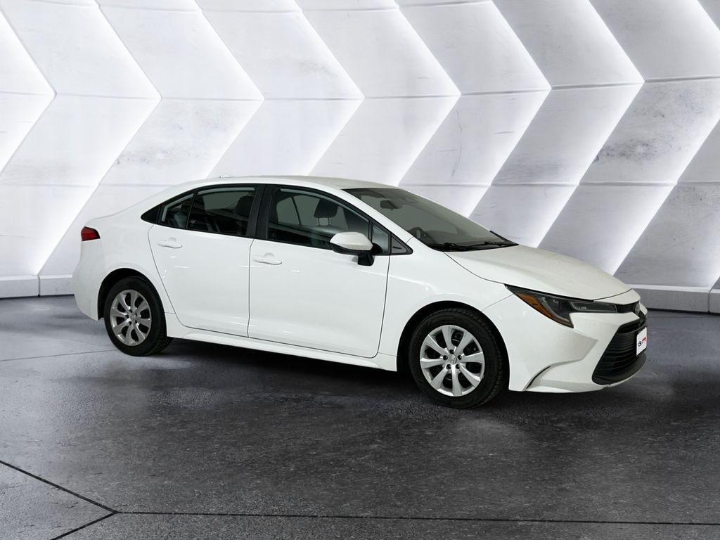 Used 2023 White Toyota LE image 1
