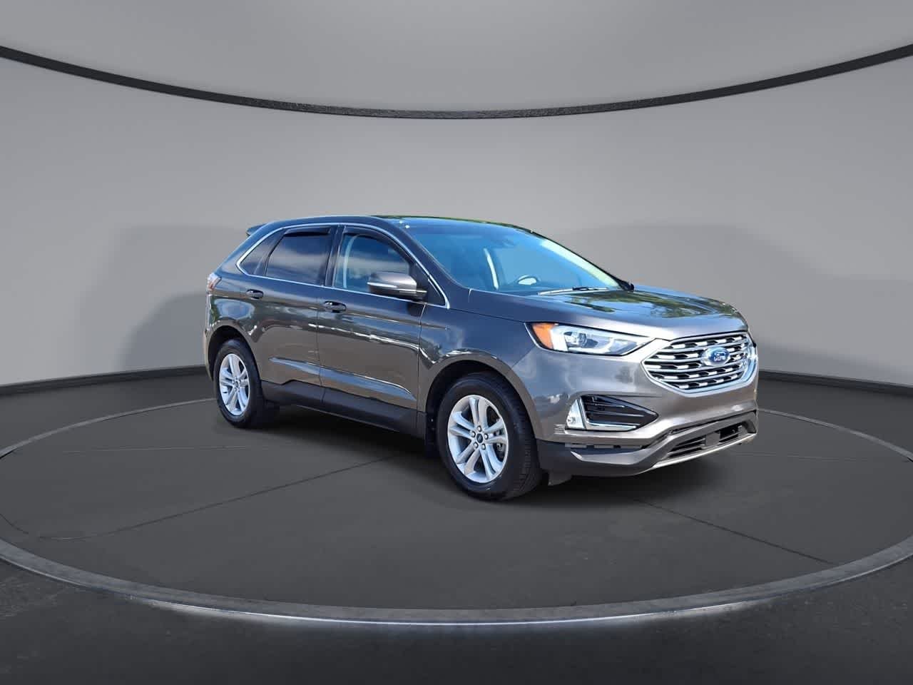 Used 2020 Magnetic Metallic Ford SEL image 2