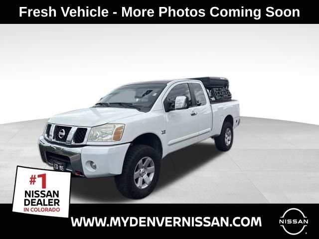 Used 2004 White Nissan LE image 1